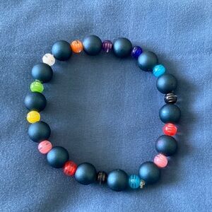 Rainbow and green rubber bead bracelet